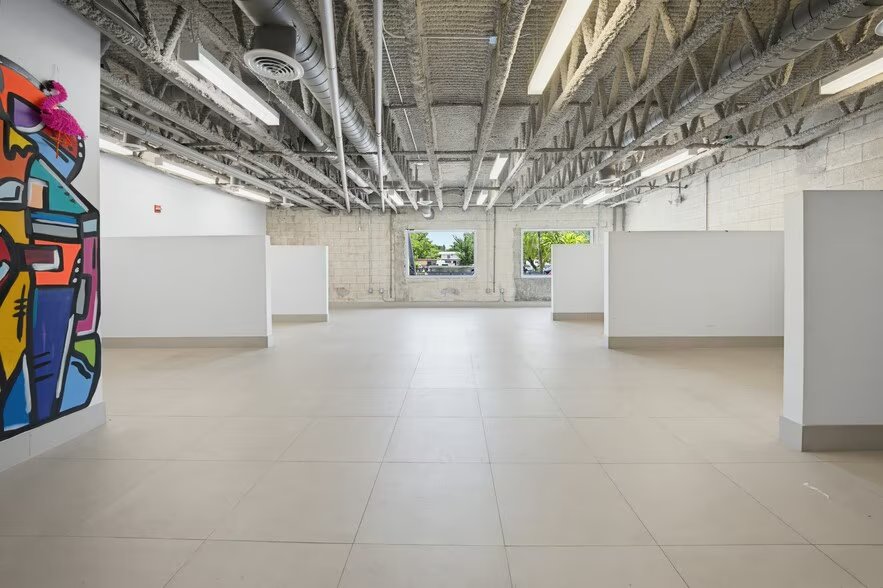 Inside the Berek Fano classroom in North Miami, showing the open studio space with student work areas